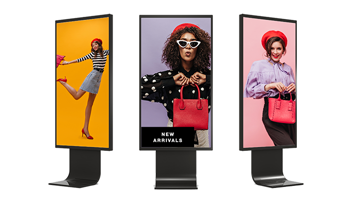 3 digital screens displaying advertisements for clothing